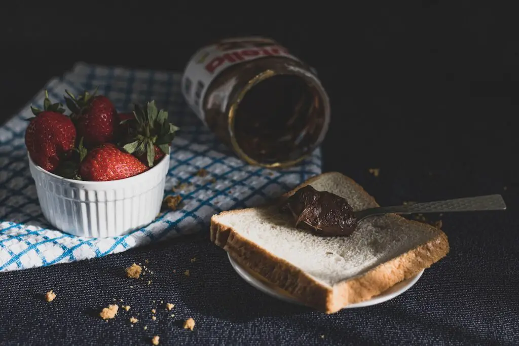 Nutella on bread with strawberries on the side. Credit: Unsplash