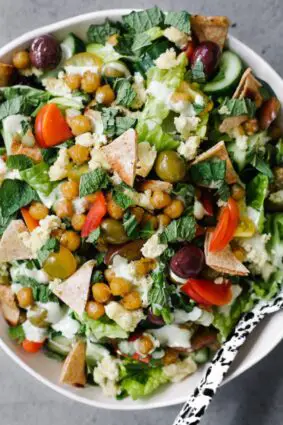 Greek Chopped Salad With Cumin-fried Chickpeas and Tahini Dressing
