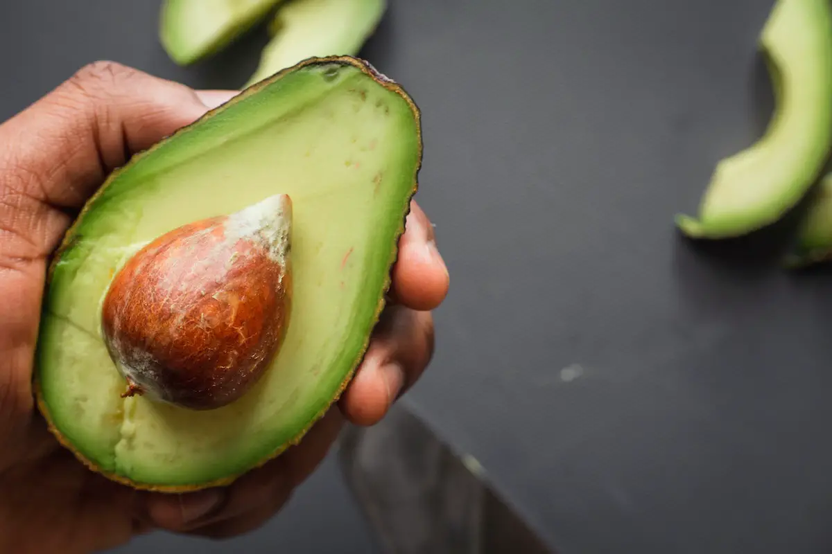 An avocado cut in half. Credit: Unsplash