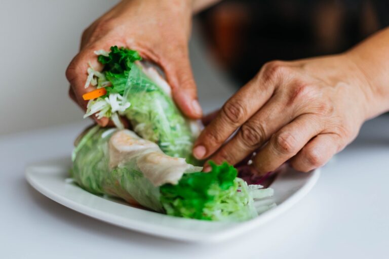 Setting a lettuce wrap on a plate. Credit: Unsplash