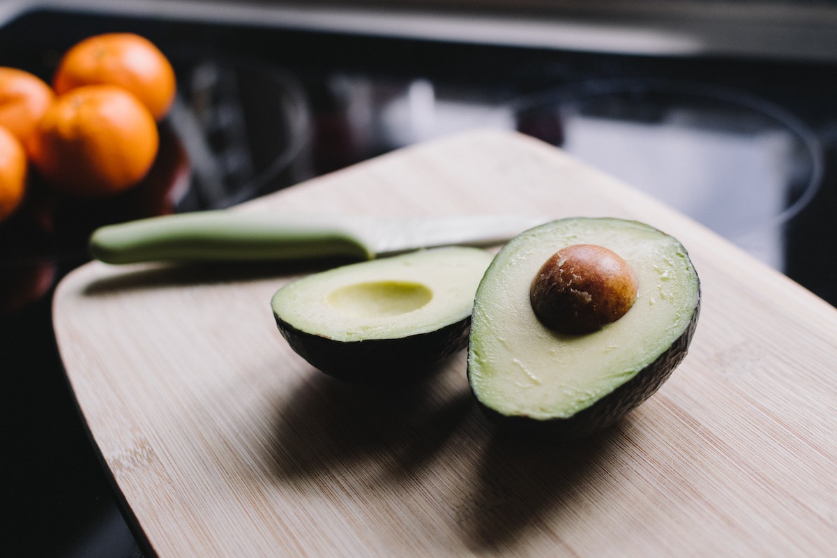 Sliced avocado on a chopping board. Credit: Unsplash