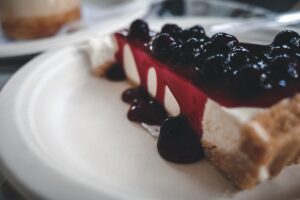 Cheesecake with blueberries on top.