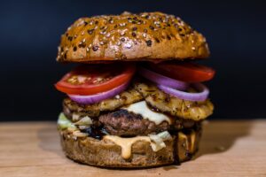 Hawaiian burger with a seeded bun. Credit: Unsplash