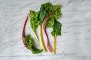 Swiss chard on a bench. Credit: Unsplash