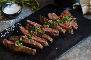 Bavette steak on a board.