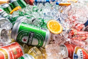 Beers sitting on ice. Credit: Unsplash