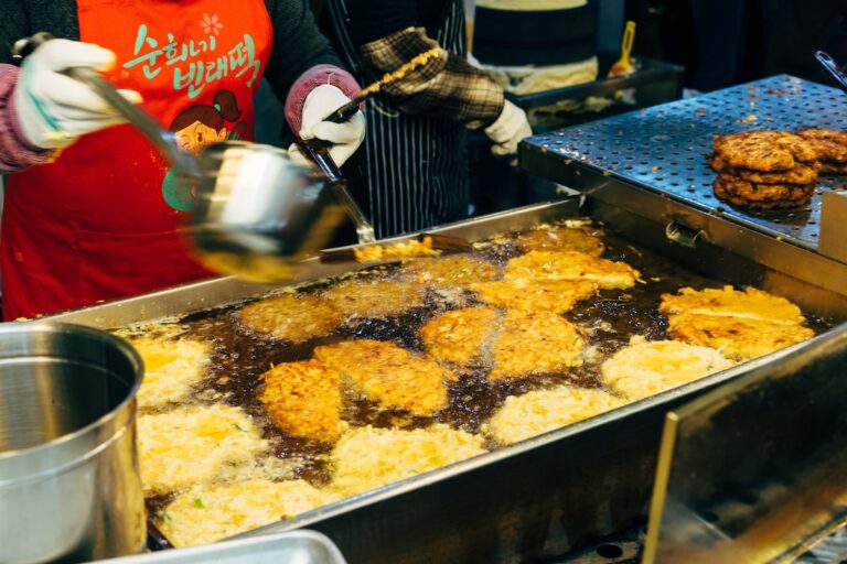 Deep frying food with oil.