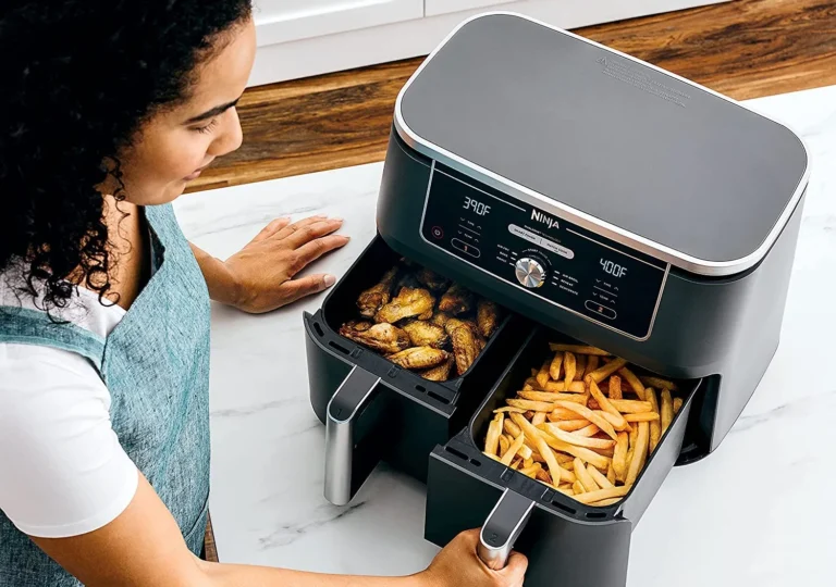 An air fryer with fries and chicken. Credit: Unknown