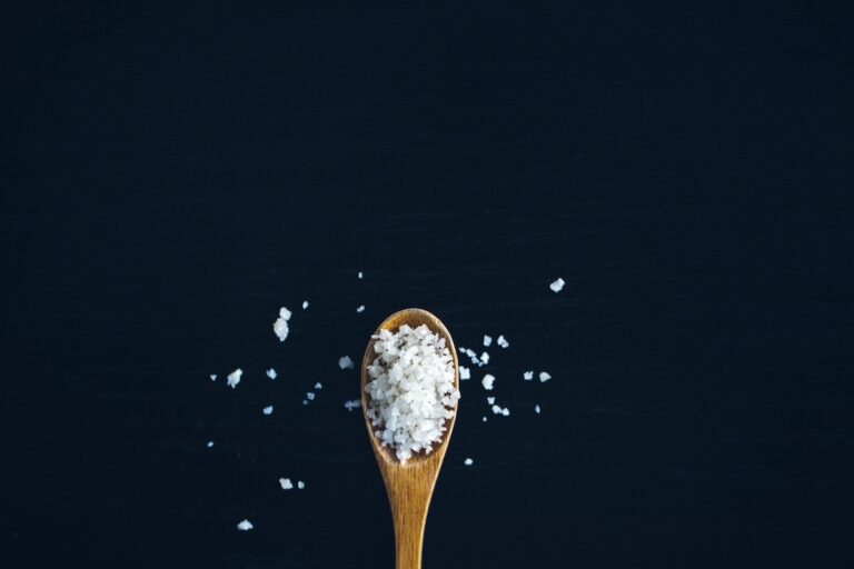 Salt on a wooden spoon. Credit: Unsplash