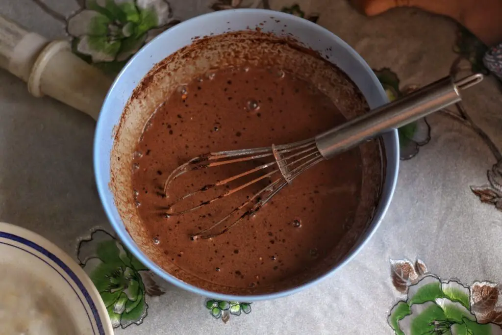 Melted chocolate in a bowl with a whisk. Credit: Unsplash