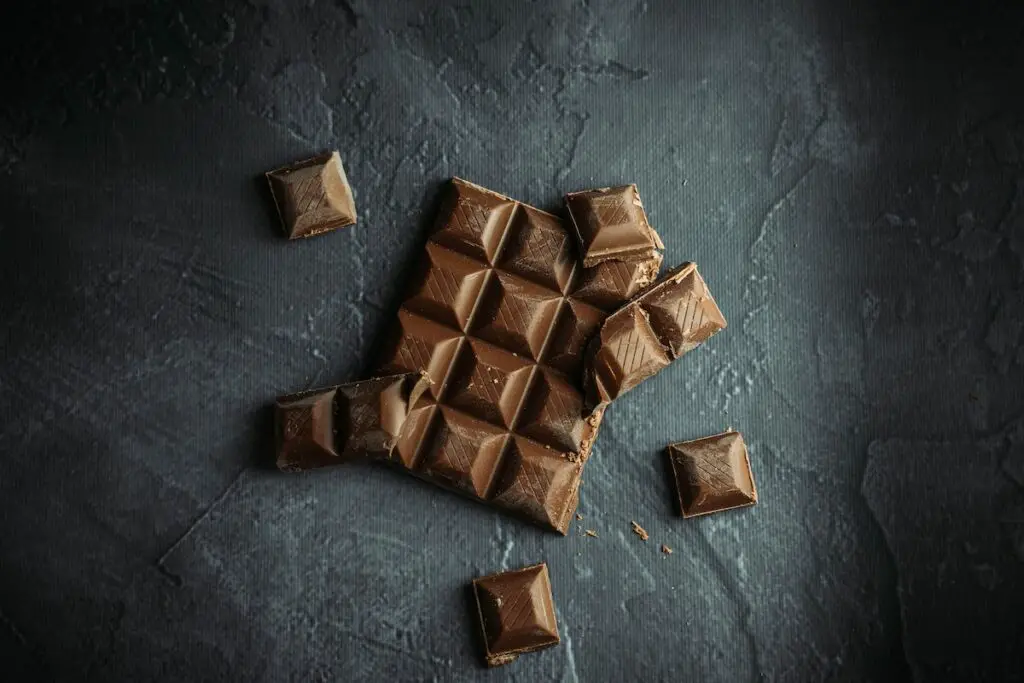 Chocolate broke up on a granite surface. Credit: Unsplash