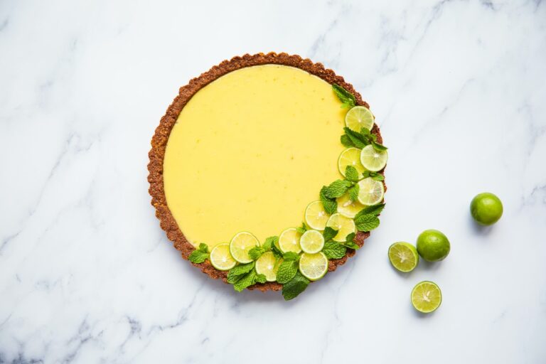 Cheesecake cooling on a wire rack.