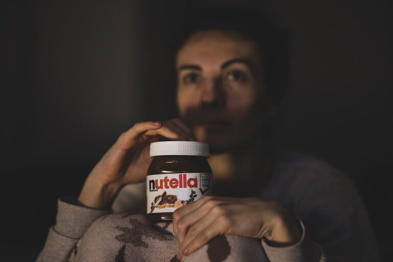 Girl holding Nutella jar. Credit: Unsplash