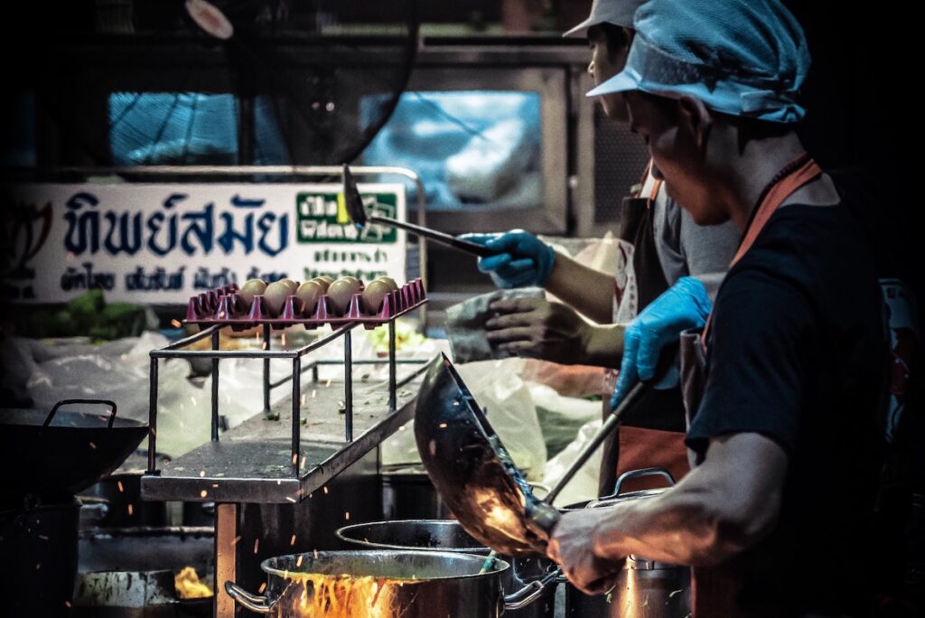 Thai street food chef's cooking.