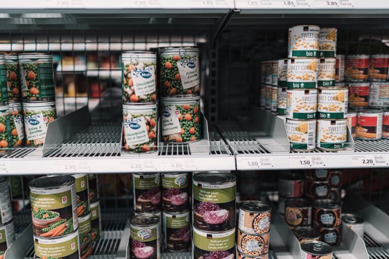 Cans supermarket shelf. Credit: Unsplash