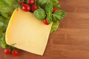 Cheddar cheese on a board. Credit: Unsplash