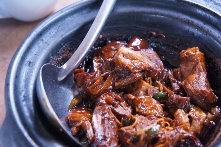 Cooked pulled pork in a bowl. Credit: Unsplash