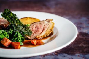 Duck breast cooked on a plate. Credit: Unsplash