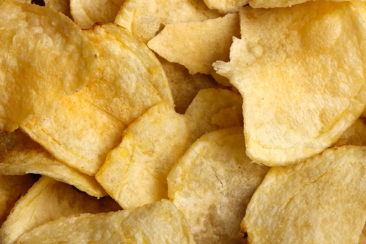Golden yellow chips (crisps for the British).