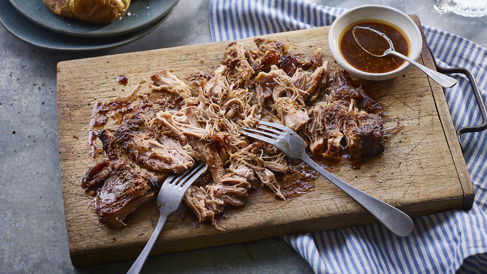 Pulled pork served on a board. Credit: BBC Good Food