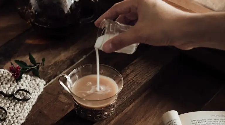Adding buttermilk to coffee.