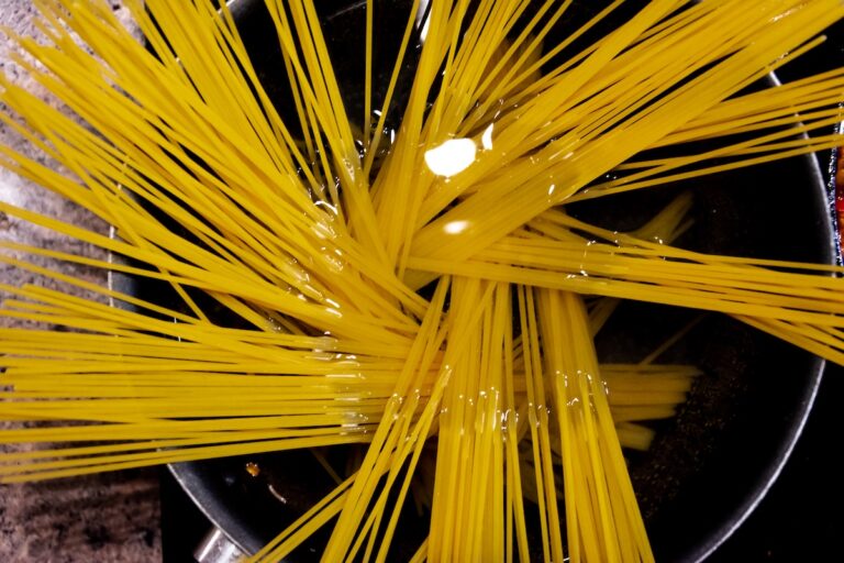 Boiling pasta in a pan.