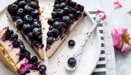 Cheesecake with blueberries on top.