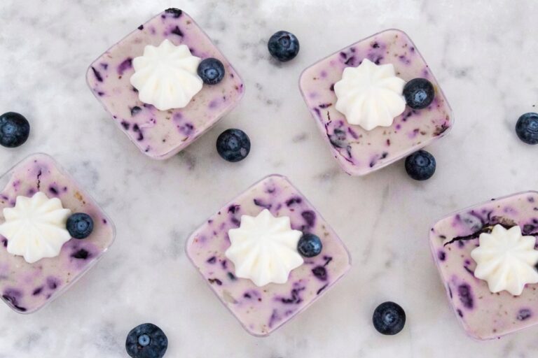 Mini blueberry cheesecakes.