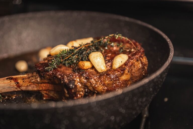 Pan frying a tomahawk steak. Credit: Unsplash