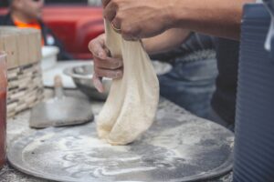 Pizza dough not stretchy.
