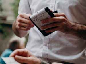 Waiter serving in a restaurant.